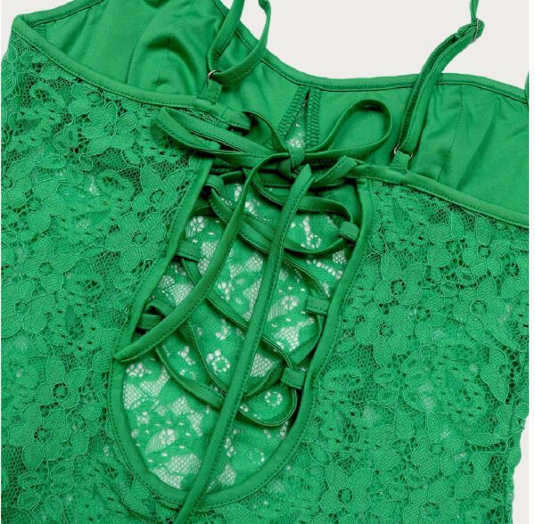 A close up of the front of a green swimsuit