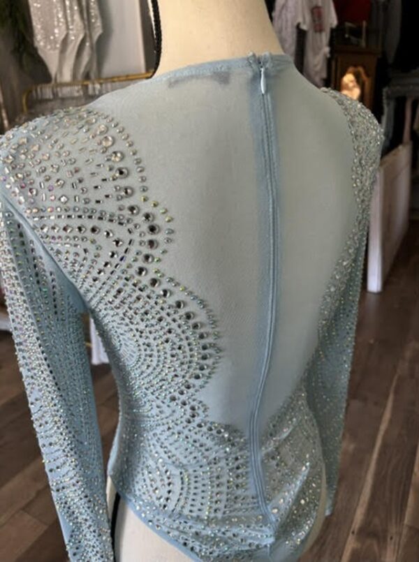 A dress that is made of light blue fabric.